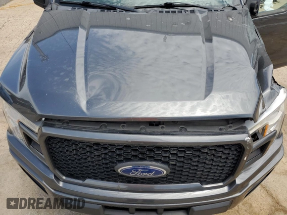 2019 Ford F-150 XL with VIN 1FTEW1CP3KFC96604, listed as a Copart auction lot 56730795 with 140,908 mi miles and Salvage title. Bid and sale history available at DreamBid. Image 11.