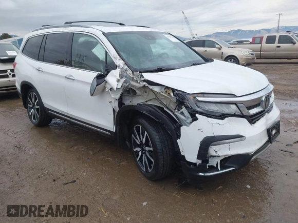 2021 Honda Pilot Elite with VIN 5FNYF6H03MB044154, listed as a IAAI auction lot 41050202 with 60,331 mi miles and . Bid and sale history available at DreamBid. Image 1.