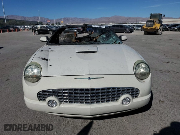 2003 Ford Thunderbird Deluxe z VIN 1FAHP60A83Y113992, wystawiony jako Copart lot #77277574 z przebiegiem Nie podano mil oraz Nie do naprawy • Non repairable. Historia ofert i sprzedaży dostępna na DreamBid. Obrazek 5.