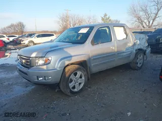 2014 Honda Ridgeline RTL with VIN 5FPYK1F57EB009199, listed as a IAAI auction lot 41208488 with 100,340 mi miles. Bid and sale history available at carsss.com. Image 17.
