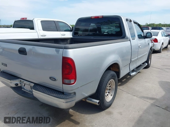2002 Ford F-150 XL with VIN 1FTRX17W62NC05363, listed as a IAAI auction lot 41897174 with 1 mi miles. Bid and sale history available at carsss.com. Image 4.