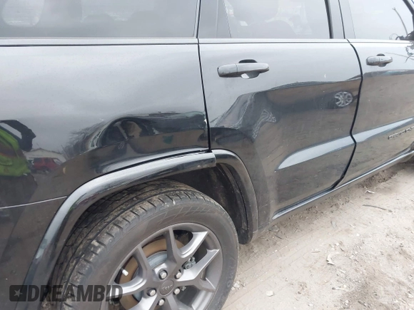 2021 Jeep Grand Cherokee 80th Anniversary with VIN 1C4RJFBG2MC614814, listed as a IAAI auction lot 41486793 with 88,089 mi miles and . Bid and sale history available at DreamBid. Image 6.