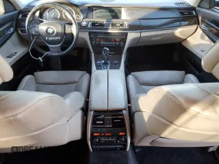 2009 BMW 7 Series 750Li with VIN WBAKB83569CY60521, listed as a Copart auction lot 82050884 with 142,788 mi miles and Salvage Title. Bid and sale history available at DreamBid. Image 8.