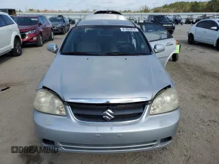2006 Suzuki Forenza z VIN KL5JD56Z66K299816, wystawiony jako Copart lot #81893914 z przebiegiem 156 416 mil mil oraz Szkoda całkowita • Salvage title. Historia ofert i sprzedaży dostępna na DreamBid. Obrazek 5.