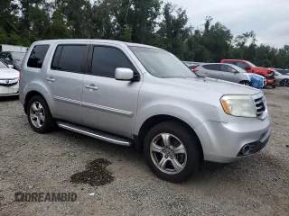 2013 Honda Pilot EX-L with VIN 5FNYF3H59DB001058, listed as a Copart auction lot 62947125 with 157,503 mi miles and Salvage title. Bid and sale history available at DreamBid. Image 4.