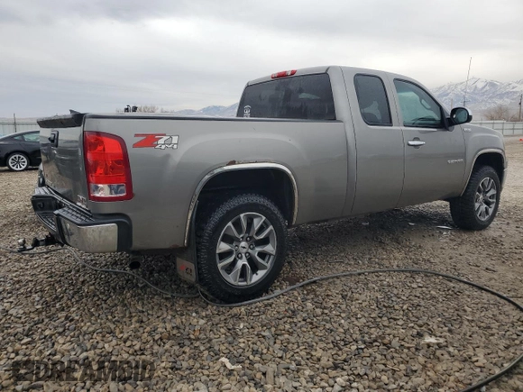 2012 GMC Sierra 1500 SLT z VIN 1GTR2WE74CZ262971, wystawiony jako Copart lot #85956964 z przebiegiem 105 004 mil mil oraz Czysty tytuł • Clean title. Historia ofert i sprzedaży dostępna na DreamBid. Obrazek 3.