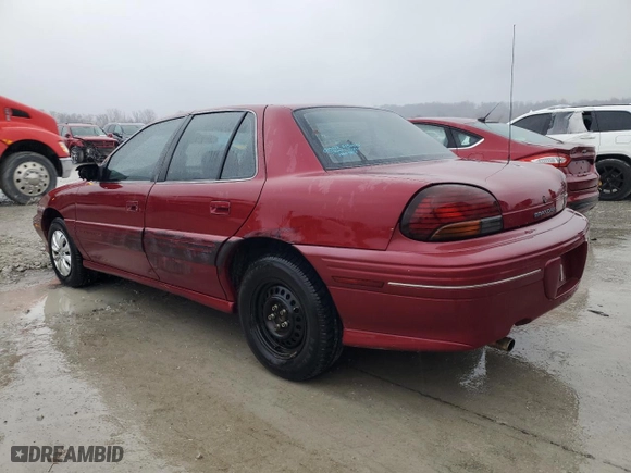 1997 Pontiac Grand Am SE with VIN 1G2NE52T4VC747929, listed as a Copart auction lot 43959975 with 142,673 mi miles and Salvage Title. Bid and sale history available at carsss.com. Image 2.