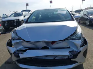 2016 Toyota Prius Two z VIN JTDKBRFU1G3016850, wystawiony jako IAAI lot #41163246 z przebiegiem 68 858 mil mil oraz . Historia ofert i sprzedaży dostępna na DreamBid. Obrazek 12.