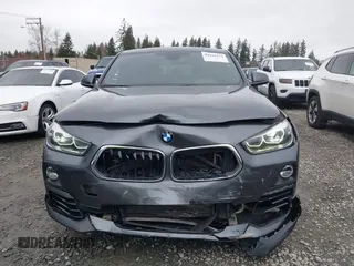 2018 BMW X2 xDrive28i with VIN WBXYJ5C37JEF74740, listed as a IAAI auction lot 41818174 with 74,155 mi miles. Bid and sale history available at carsss.com. Image 6.