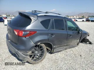 2014 Mazda CX-5 Touring with VIN JM3KE4CY6E0375084, listed as a Copart auction lot 46344065 with 143,828 mi miles and Salvage Title. Bid and sale history available at carsss.com. Image 3.