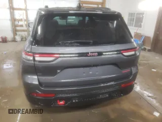 2022 Jeep Grand Cherokee Trailhawk with VIN 1C4RJHCG8N8572275, listed as a Copart auction lot 85665194 with 15,692 mi miles and Salvage title. Bid and sale history available at DreamBid. Image 6.