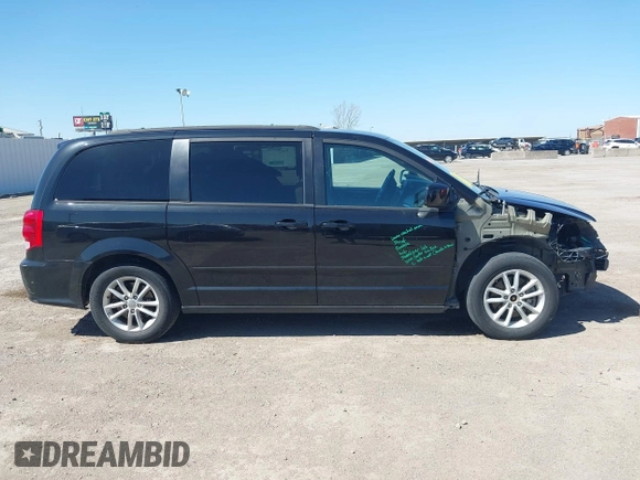 2016 Dodge Grand Caravan SXT with VIN 2C4RDGCG0GR387856, listed as a IAAI auction lot 41769163 with 103,856 mi miles and . Bid and sale history available at DreamBid. Image 14.