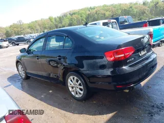 2015 Volkswagen Jetta Sedan 1.8T SE with VIN 3VWD17AJ6FM285921, listed as a IAAI auction lot 42005164 with 173,028 mi miles. Bid and sale history available at carsss.com. Image 3.