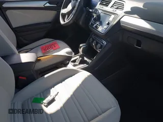 2024 Volkswagen Tiguan S with VIN 3VVFB7AX7RM063715, listed as a IAAI auction lot 41974650 with 23,374 mi miles and . Bid and sale history available at DreamBid. Image 5.
