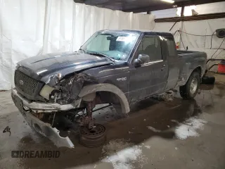 2002 Ford Ranger with VIN 1FTZR15U52PA08409, listed as a Copart auction lot 87858015 with 128,892 mi miles and Salvage Title. Bid and sale history available at DreamBid. Image 1.