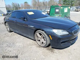 2014 BMW 6 Series 640i xDrive with VIN WBA6B8C58EDZ72405, listed as a IAAI auction lot 42076517 with 101,704 mi miles. Bid and sale history available at carsss.com. Image 1.
