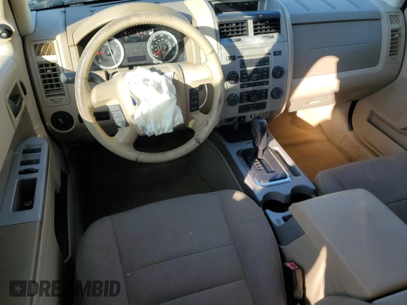 2010 Ford Escape XLT с VIN 1FMCU0D71AKA71198, выставлен на аукционе Copart как лот 48766805 с пробегом 243 732 миль миль и Списание • Salvage title. История ставок и продаж доступна на DreamBid. Изображение 8.