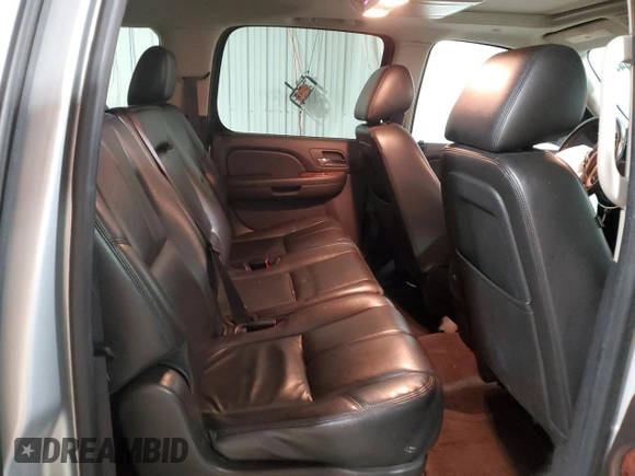 2013 Chevrolet Suburban LT with VIN 1GNSKJE76DR119873, listed as a Copart auction lot 53239445 with 197,172 mi miles and Salvage Title. Bid and sale history available at DreamBid. Image 11.