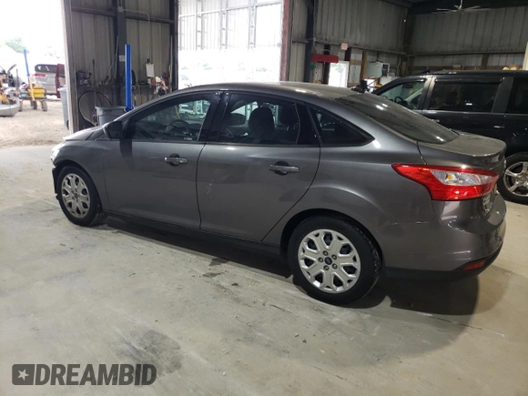 2012 Ford Focus SE z VIN 1FAHP3F28CL444261, wystawiony jako Copart lot #61174145 z przebiegiem 77 612 mil mil oraz Szkoda całkowita • Salvage title. Historia ofert i sprzedaży dostępna na DreamBid. Obrazek 2.