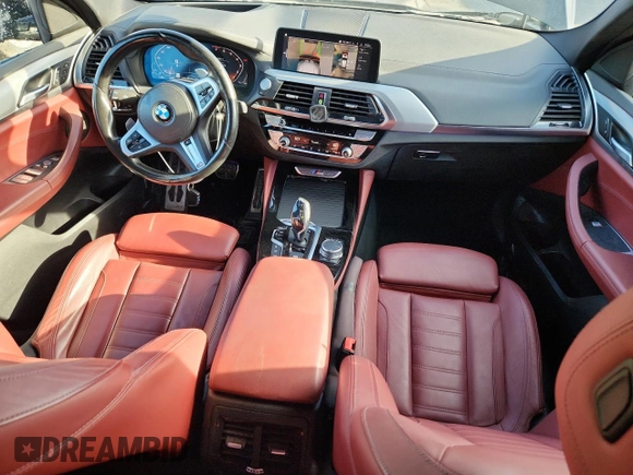 2021 BMW X4 M40i with VIN 5UX2V5C05M9F68427, listed as a Copart auction lot 64941095 with 50,208 mi miles and Salvage title. Bid and sale history available at DreamBid. Image 8.