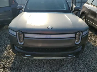 2023 Rivian R1T Adventure with VIN 7FCTGAAA5PN023738, listed as a Copart auction lot 63131724 with 141 mi miles and Salvage Title. Bid and sale history available at carsss.com. Image 11.