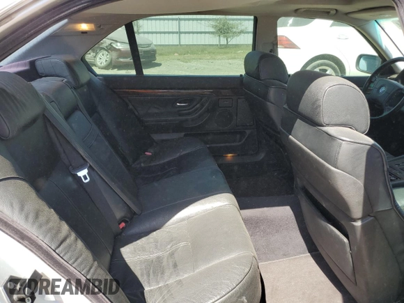 1999 BMW 7 Series 740il with VIN WBAGH8332XDP00274, listed as a Copart auction lot 74191654 with 134,901 mi miles and Salvage Title. Bid and sale history available at carsss.com. Image 10.