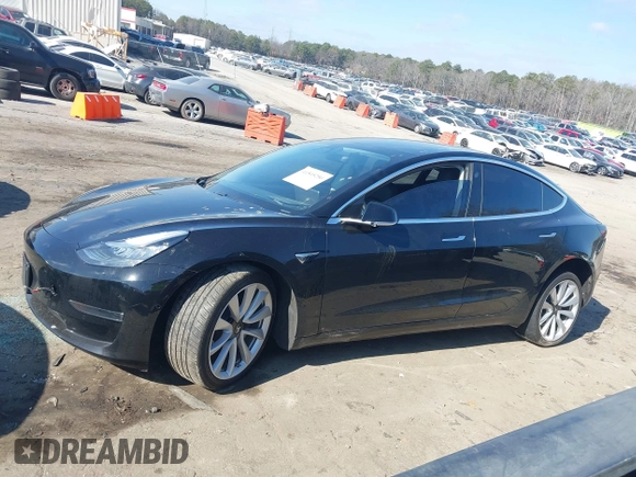2020 Tesla Model 3 Standard Range Plus with VIN 5YJ3E1EA0LF660759, listed as a IAAI auction lot 41505250 with 63,322 mi miles and . Bid and sale history available at DreamBid. Image 14.