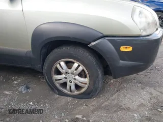 2006 Hyundai Tucson GLS with VIN KM8JN12D46U352491, listed as a IAAI auction lot 41749563 with 151,930 mi miles. Bid and sale history available at carsss.com. Image 6.