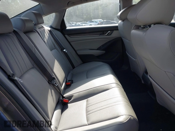 2020 Honda Accord Touring with VIN 1HGCV3F90LA013434, listed as a IAAI auction lot 42075502 with 56,645 mi miles and . Bid and sale history available at DreamBid. Image 8.
