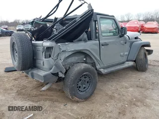 2018 Jeep Wrangler Sport S with VIN 1C4GJXAGXJW197483, listed as a IAAI auction lot 41825305 with 64,173 mi miles and . Bid and sale history available at DreamBid. Image 4.