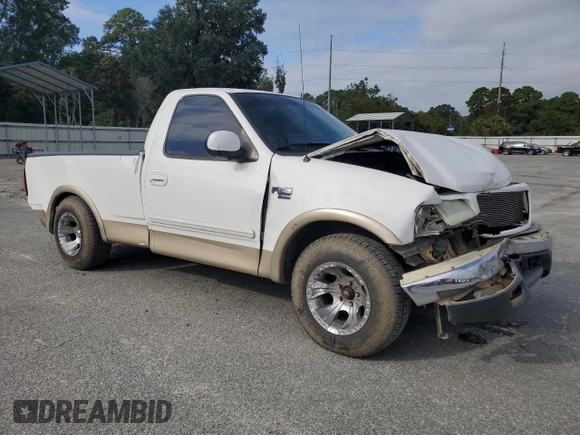 1999 Ford F-150 XL with VIN 1FTRF17L8XNA75702, listed as a Copart auction lot 69868104 with Not provided miles and Salvage title. Bid and sale history available at DreamBid. Image 4.