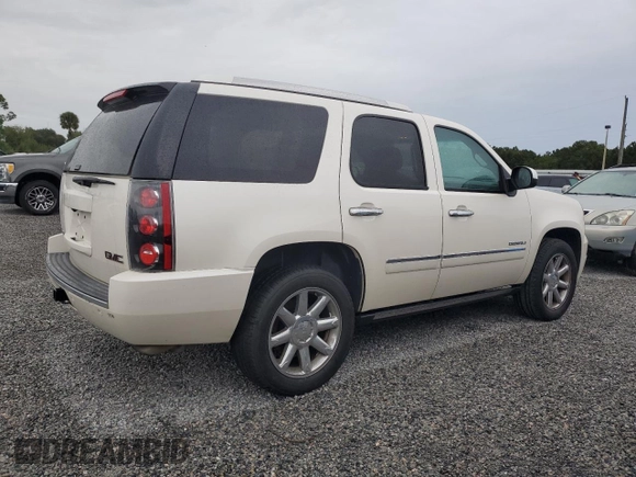 2014 GMC Yukon Denali with VIN 1GKS2EEF0ER102970, listed as a Copart auction lot 73739364 with 125,312 mi miles and Non Repairable. Bid and sale history available at carsss.com. Image 3.