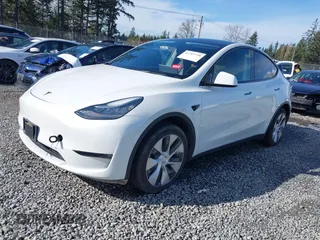 2021 Tesla Model Y Standard Range with VIN 5YJYGDED9MF110697, listed as a IAAI auction lot 41707730 with Not Provided miles and . Bid and sale history available at carsss.com. Image 19.