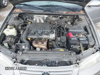 1998 Toyota Camry LE z VIN 4T1BF22K2WU042166, wystawiony jako IAAI lot #42416930 z przebiegiem 124 809 mil mil oraz . Historia ofert i sprzedaży dostępna na DreamBid. Obrazek 10.