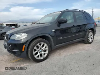 2012 BMW X5 35i with VIN 5UXZV4C51CL989449, listed as a Copart auction lot 56762095 with 112,576 mi miles and Salvage title. Bid and sale history available at DreamBid. Image 1.