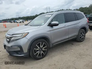 2019 Honda Pilot Touring 8-Passenger with VIN 5FNYF5H96KB028956, listed as a Copart auction lot 57622015 with 104,949 mi miles and Salvage title. Bid and sale history available at DreamBid. Image 1.