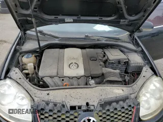 2007 Volkswagen Jetta Wolfsburg Edition z VIN 3VWEF71K67M061788, wystawiony jako Copart lot #57208365 z przebiegiem 184 055 mil mil oraz Szkoda całkowita • Salvage title. Historia ofert i sprzedaży dostępna na DreamBid. Obrazek 11.