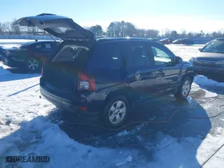 2014 Jeep Compass Sport with VIN 1C4NJCBA2ED594035, listed as a IAAI auction lot 41282961 with 118,606 mi miles. Bid and sale history available at carsss.com. Image 4.