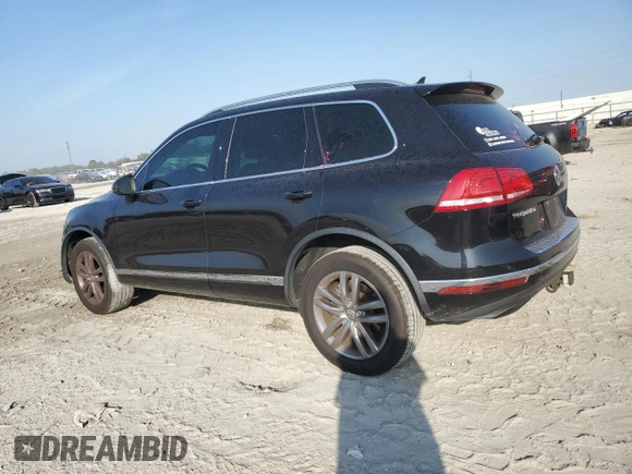 2016 Volkswagen Touareg Sport with VIN WVGEF9BP7GD010767, listed as a Copart auction lot 44782585 with 125,970 mi miles and Salvage Title. Bid and sale history available at DreamBid. Image 2.