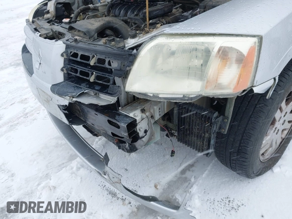 2005 Mitsubishi Endeavor LS with VIN 4A4MN21S95E048601, listed as a IAAI auction lot 41610976 with 126,464 mi miles. Bid and sale history available at carsss.com. Image 6.