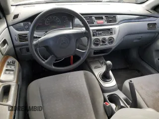 2005 Mitsubishi Lancer ES with VIN JA3AJ26E35U024307, listed as a Copart auction lot 74433184 with 189,115 mi miles and Salvage Title. Bid and sale history available at carsss.com. Image 8.