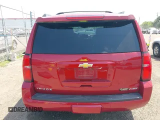 2015 Chevrolet Tahoe LT with VIN 1GNSKBKC6FR628355, listed as a IAAI auction lot 42159743 with 95,730 mi miles and . Bid and sale history available at DreamBid. Image 16.