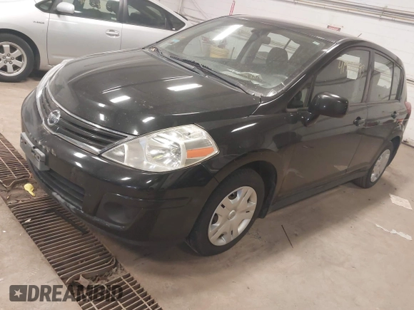 2012 Nissan Versa S with VIN 3N1BC1CP9CK248665, listed as a IAAI auction lot 41974293 with 146,465 mi miles. Bid and sale history available at carsss.com. Image 2.