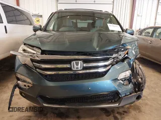 2016 Honda Pilot Elite with VIN 5FNYF6H09GB085621, listed as a IAAI auction lot 41788911 with 137,199 mi miles. Bid and sale history available at carsss.com. Image 13.