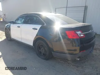 2014 Ford Police Interceptor with VIN 1FAHP2MK4EG124301, listed as a IAAI auction lot 41596193 with 101,314 mi miles and . Bid and sale history available at DreamBid. Image 3.