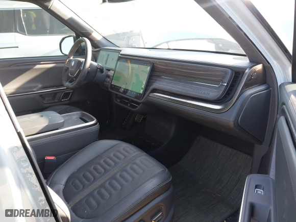 2022 Rivian R1T Adventure Package with VIN 7FCTGAAA5NN007018, listed as a IAAI auction lot 42018939 with 41,991 mi miles. Bid and sale history available at carsss.com. Image 5.