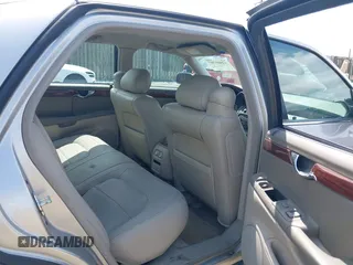 2005 Cadillac DeVille z VIN 1G6KD54Y15U158635, wystawiony jako IAAI lot #42469707 z przebiegiem 136 336 mil mil oraz . Historia ofert i sprzedaży dostępna na DreamBid. Obrazek 8.