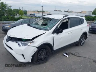 2018 Toyota RAV4 LE with VIN JTMBFREV6JJ210226, listed as a IAAI auction lot 42700312 with Not provided miles and . Bid and sale history available at DreamBid. Image 2.