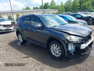 2015 Mazda CX-5 Touring with VIN JM3KE4CY9F0506879, listed as a IAAI auction lot 42209768 with 87,690 mi miles and . Bid and sale history available at DreamBid. Image 1.