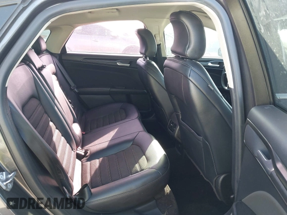 2018 Ford Fusion SE z VIN 3FA6P0LU8JR116073, wystawiony jako IAAI lot #41773037 z przebiegiem 100 864 mil mil oraz . Historia ofert i sprzedaży dostępna na DreamBid. Obrazek 8.